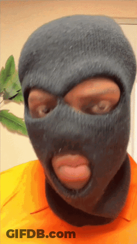 Man In Ski Mask Tongue Out GIF