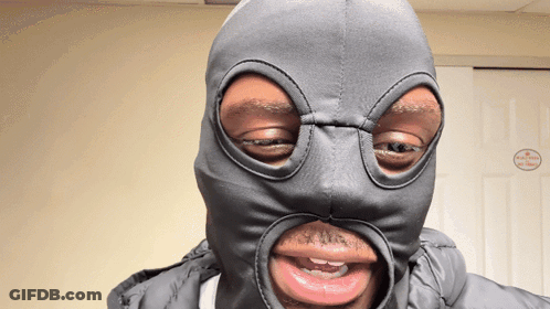 Man In Ski Mask With Hole GIF