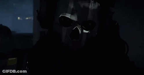 Man In Skull Mask And Headphones In Car GIF