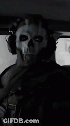 Man In Skull Mask And Headphones In Car GIF