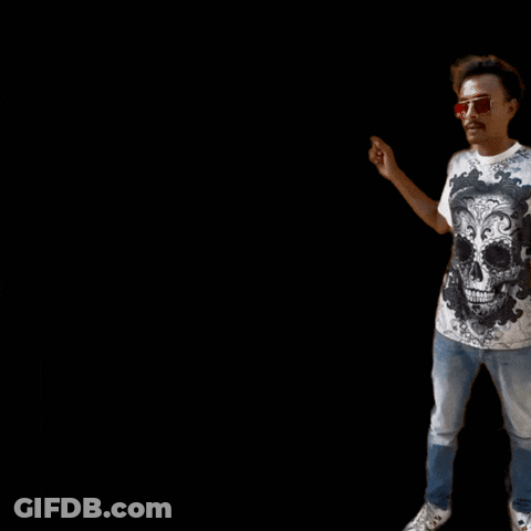 Man In Skull Shirt Pointing At Type GIF