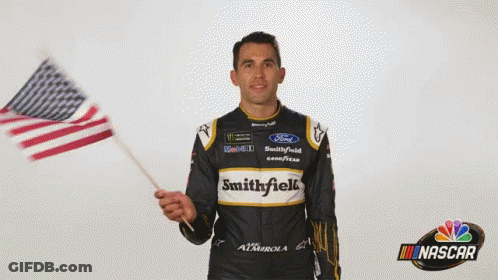 Man In Smithfield Jersey Holding American Flag GIF