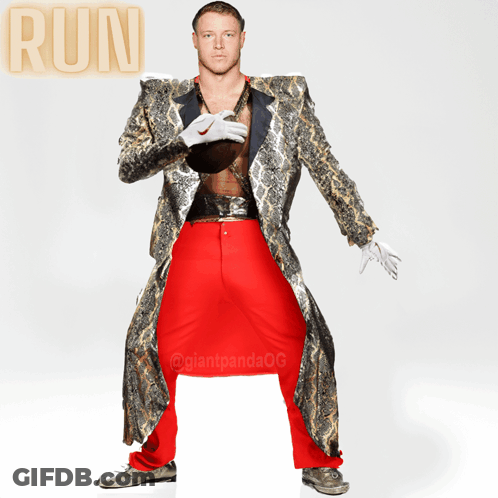 Man In Snakeskin Coat And Red Pants Holding Football Saying Run GIF