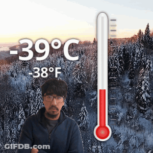 Man In Snowy Forest With Thermometer 39 Degrees Celsius GIF