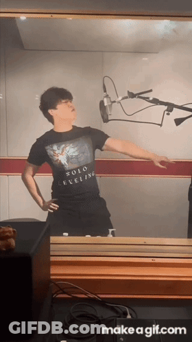 Man In Solo Leveling T-Shirt At Microphone GIF