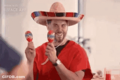 Man In Sombrero Holding Maracas GIF