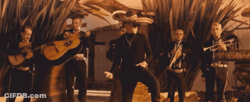 Man In Sombrero In Front Of Band GIF