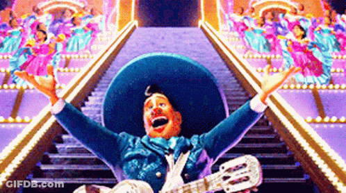 Man In Sombrero Playing Guitar In Front Of Stairs GIF