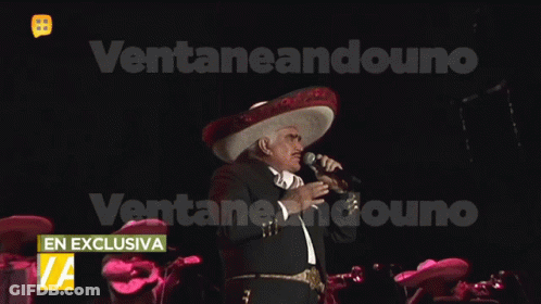 Man In Sombrero Singing Into Microphone GIF