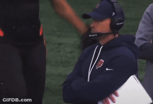 Man In Sony Headset On Football Field GIF