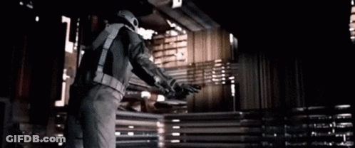 Man In Space Suit By Curtain GIF