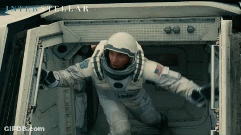 Man In Space Suit Jumping From Spaceship Interstellar GIF