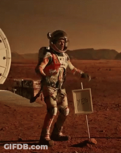 Man In Space Suit Next To Yes Sign GIF