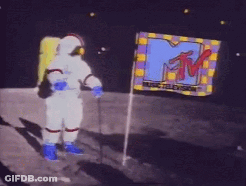 Man In Space Suit On Moon In Front Of MTV Logo GIF