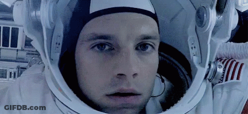 Man In Space Suit Wearing Helmet GIF