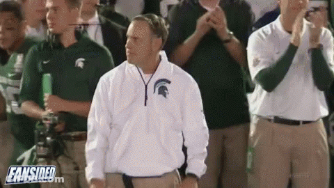 Man In Spartan Jacket Standing Before Crowd GIF