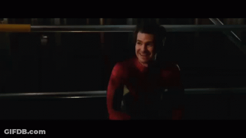 Man In Spider-Man Costume In Dark Room GIF
