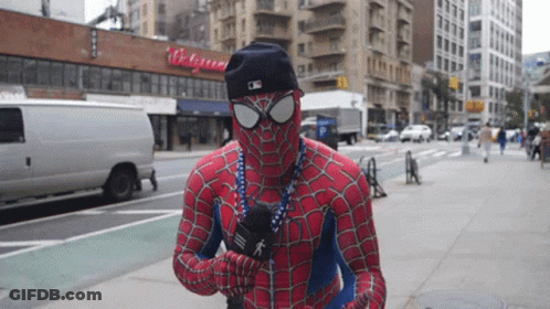 Man In Spiderman Costume Holding Microphone GIF