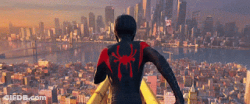 Man In Spiderman Costume In Front Of City Skyline GIF