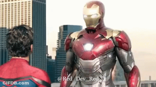 Man In Spiderman Costume Next To Iron Man GIF