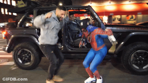 Man In Spiderman Costume Next To Jeep GIF