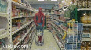 Man In Spiderman Costume Pushing Shopping Cart GIF