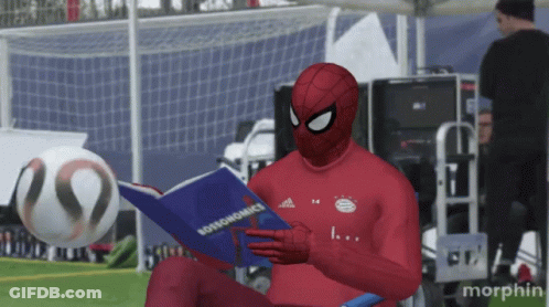 Man In Spiderman Costume Reading Bossonomics GIF