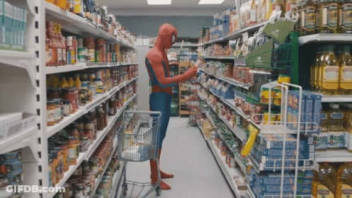 Man In Spiderman Costume Shopping In Supermarket GIF