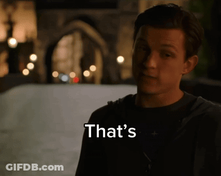 Man In Spiderman Costume Standing In Front Of Lockers GIF