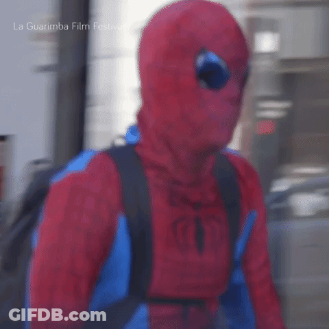 Man In Spiderman Costume Walking Down Street GIF