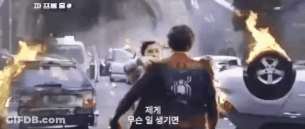 Man In Spiderman Shirt Walking Down Street GIF