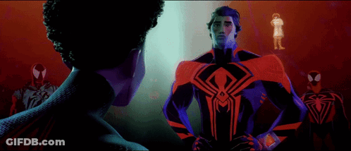 Man In Spiderman Suit Standing Beside Woman GIF