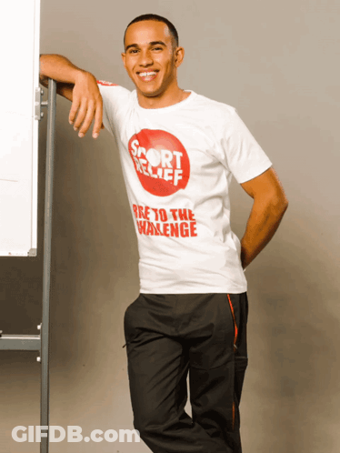 Man In Sport Relief T-Shirt Leaning Against Pole GIF