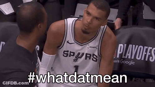 Man In Spurs Jersey Sitting In Stands GIF