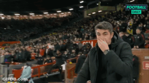 Man In Stadium With Football Daily Sign GIF