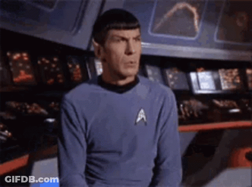 Man In Star Trek Uniform At Control Panel GIF