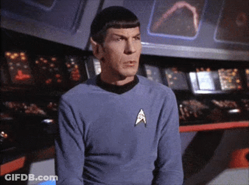 Man In Star Trek Uniform At Control Panel GIF