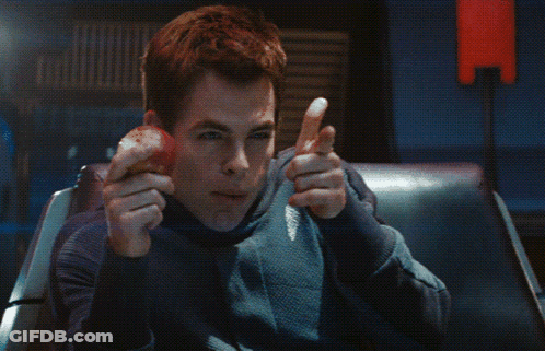 Man In Star Trek Uniform Eating Apple And Flipping Off GIF