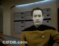 Man In Star Trek Uniform Holding Chest GIF