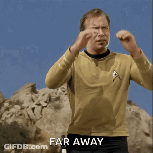 Man In Star Trek Uniform Making Far Away Gesture GIF