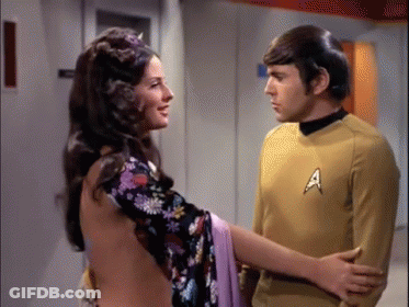 Man In Star Trek Uniform Standing With Woman GIF