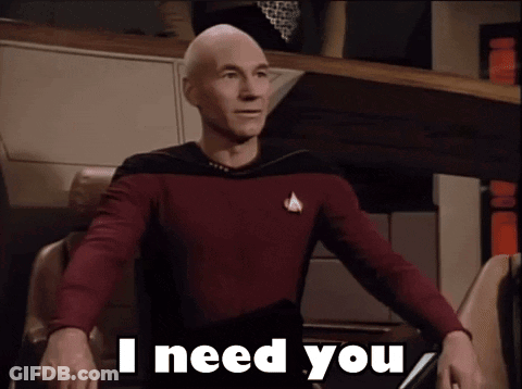 Man In Star Trek Uniform Waving GIF
