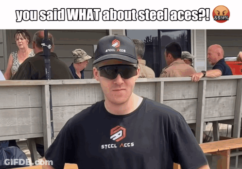 Man In STCCL ACCS T-Shirt Standing Before Group GIF