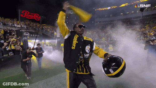 Man In Steelers Jacket Holding Helmet GIF