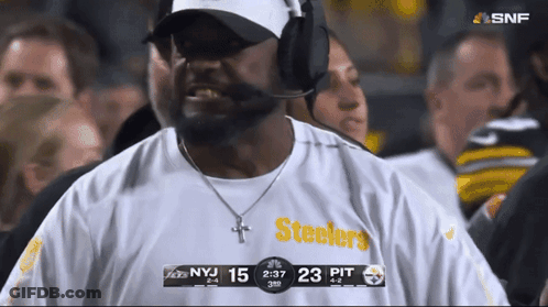 Man In Steelers Shirt Standing In Crowd GIF