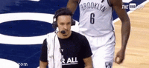 Man In Stop Me Lanyard Interviewed GIF