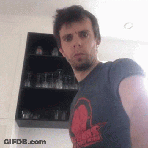 Man In Storm Chasers T-Shirt By Wine Glasses GIF