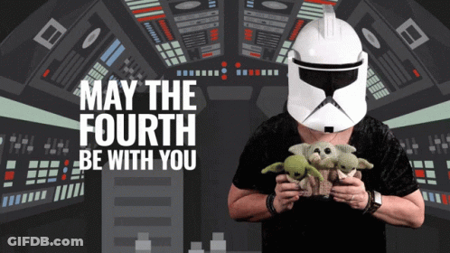 Man In Stormtrooper Helmet Holding Stuffed Animals GIF