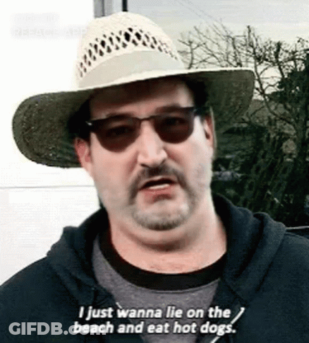 Man In Straw Hat And Sunglasses Saying I Just Wanna Lie On The Beach And Eat Hot Dogs GIF