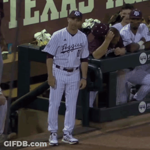 Man In Striped Aggies Jersey On Field GIF